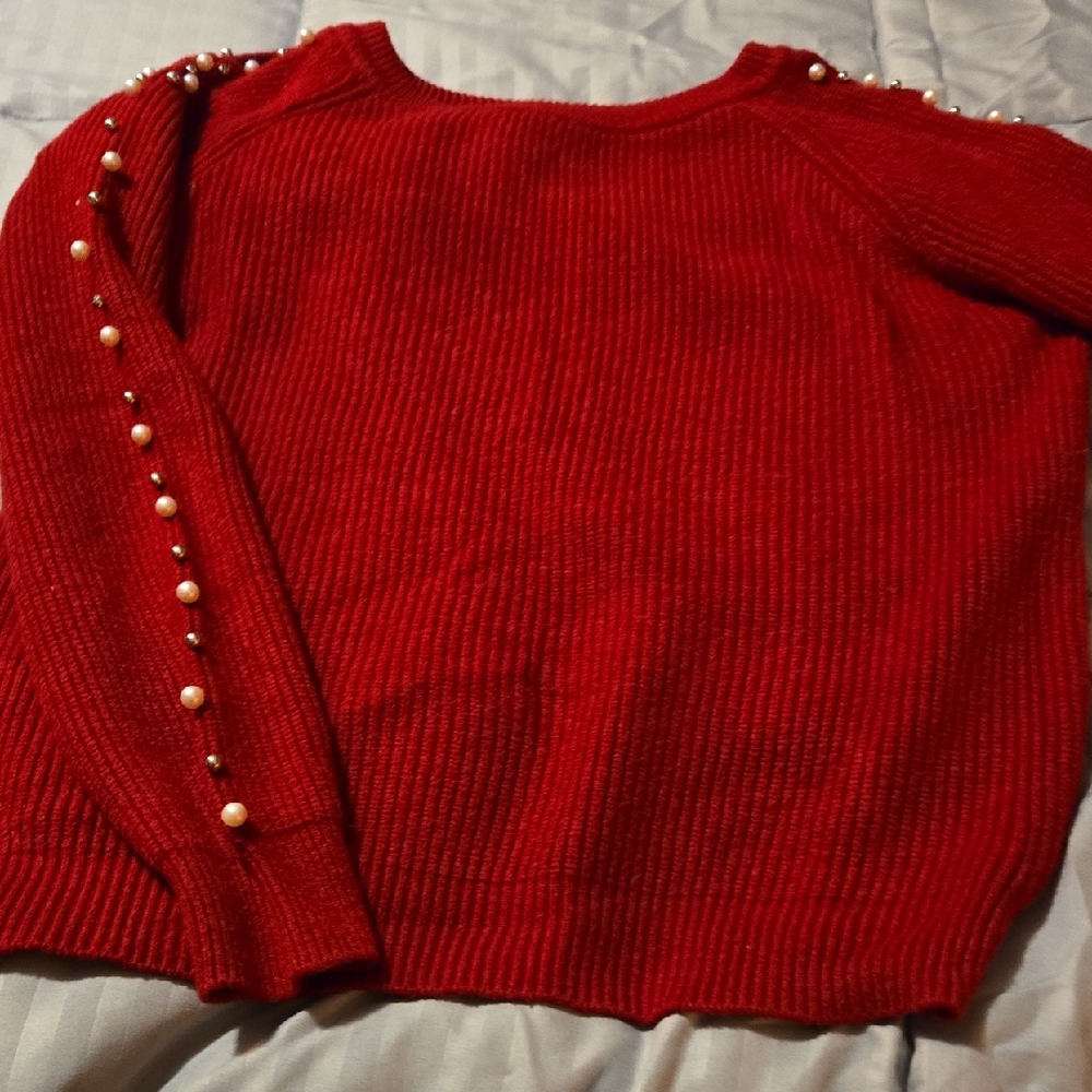 Chic Red Sweater with Pearl Detailing